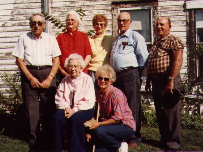 Cora with some of her cousins' children in front of Sever and Bertha's house, ca 1988